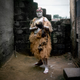 Illustration for article titled You and I will never look as bad-ass as these Congolese magician-wrestlers
